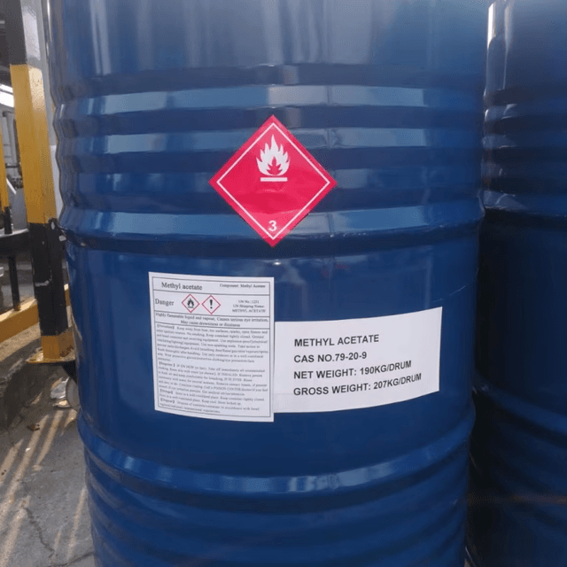 Methyl acetate in a blue drum with safety labels